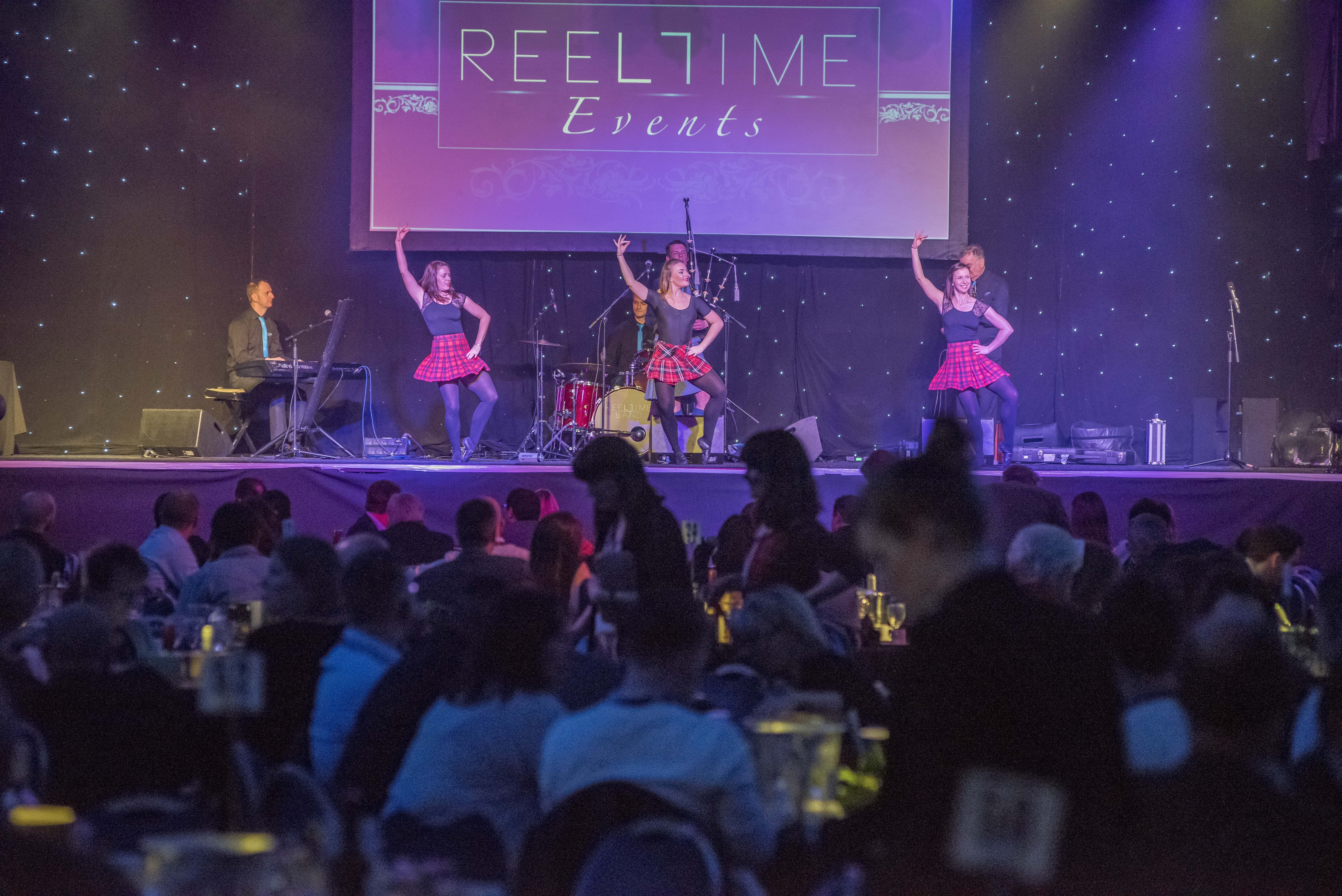 Tartanium rocking the stage at the Visit Scotland Expo at the Corn Exchange